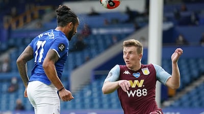Everton's Theo Walcott heads home their late equaliser. Reuters