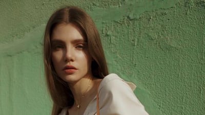 SET IN STONE: Dress, Dh1,550, Bedouin. Man’s shirt (worn underneath), Dh1,840; Sofia bag, Dh6,650, both from Salvatore Ferragamo. Spiky necklace, Dh29,500, Messika Paris at Ahmed Seddiqi & Sons