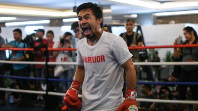 Manny Pacquiao takes part in a training session at a gym in Kuala Lumpur ahead of his WBA world welterweight bout against Argentina's Lucas Matthysse on July 15. AFP