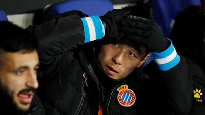 Espanyol's Wu Lei on the substitutes bench before the match. Reuters
