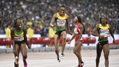 Jamaica’s Shericka Jackson, left, Christine Day and Novlene Williams-Mills celebrate after their 400-metre relay victory on Sunday. Franck Robichon / EPA
