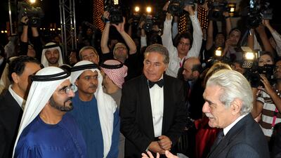Sheikh Mohammed bin Rashed, Vice President and Ruler of Dubai, meets actor Omar Sharif at closing night at the 6th Dubai International Film Festival in 2009. Getty Images