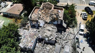A heavily damaged house in a residential area in the city of Yehud, in central Israel. AFP