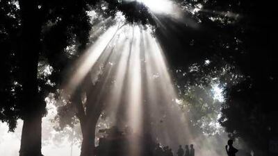 Malian youths stand next to French army tanks in a street in Niono. French defence minister Jean-Yves Le Drian said today that the goal of France's military action in Mali was to retake control of the entire country from Islamist militants who have seized the north.