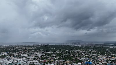 Storm clouds looming over Kingston, Jamaica. AP