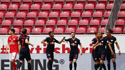 Leipzig's German forward Timo Werner, centre, celebrates scoring with his teammates. AFP