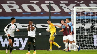 West Ham United goalkeeper Lukasz Fabianski (centre) celebrates. PA