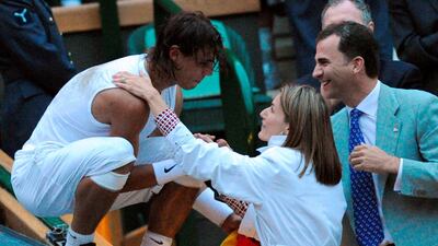 Rafael Nadal of Spain is congratulated by Crown Prince Felipe and Princess Letizia of Spain following his victory over Roger Federer in 2008. AFP