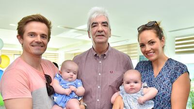 Dr David Robertson with a couple who conceived with the help of Bourn Hall Fertility Clinic, Dubai. Bourn Hall