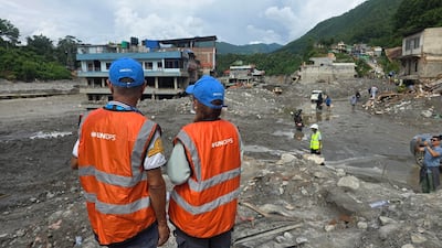 Two UNOPS workers in the Dhunge region in Nuwakot, Nepal. Photo: UNOPS