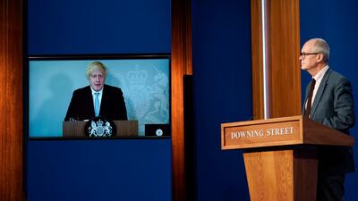 Chief Scientific Advisor Patrick Vallance attends a media briefing on coronavirus at Downing Street with Boris Johnson attending online via a screen from Chequers, the country house of the prime minister, where he was self-isolating on July 19.