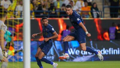 Cristiano Ronaldo attempts to shoot the ball during Al Nassr's match against Al Khaleej. AFP