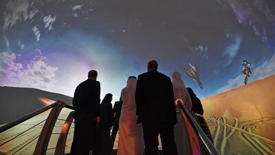 Participants watch a movie advertising Saudi's Red Sea giga-project on the sidelines of the three-day Future Investment Initiatives conference in Riyadh, on October 25, 2017. Saudi Arabia said it aims to nearly double the assets of its Public Investment Fund by 2020 through launching a programme of investment initiatives. AFP