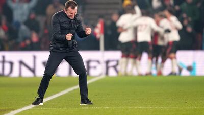 Southampton manager Nathan Jones celebrates a goal by Adam Armstrong before it is ruled out after a VAR check. PA