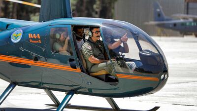 A Lebanese Air Force Robinson R44 Raven II helicopter prepares for take off with journalists during a press tour at Rayak military air base in the Bekaa Valley.