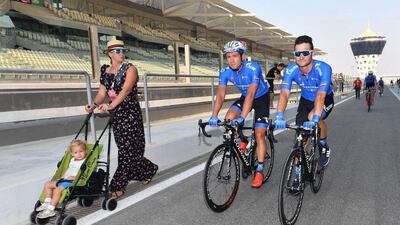 Two riders of the Gazprom Kusvelo team prior the start of the fourth stage. Luca Zennaro / EPA