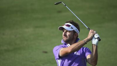 Jbe Kruger of South Africa plays his second shot on the 16th hole during the final round of the Dubai Open at The Els Club Dubai on December 21, 2014 in Dubai, United Arab Emirates. (Photo by Francois Nel/Getty Images)
