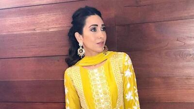 Karisma Kapoor in a simply-cut, lavishly embroidered Manish Malhotra creation