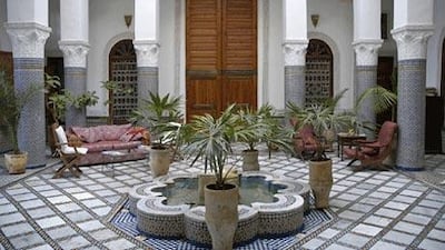 The classic courtyard is almost always symmetrical in design, with distinctive features such as a central fountain and elaborate tiles.