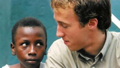 Craig Kielburger, pictured here with a child labourer, established Free the Children after reading a newspaper article about a Pakistani boy who was murdered for campaigning against child labour.