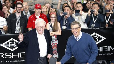 Berkshire Hathaway CEO Warren Buffett (left) and friend Bill Gates, founder of Microsoft. Rick Wilking / Reuters