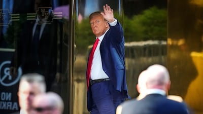 Former President Donald Trump arrives at Trump Tower in New York on April 3. Trump is expected to be booked and arraigned on charges of hush money payments during his 2016 campaign. AP