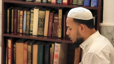 A man takes time for reflection during Ramadan.