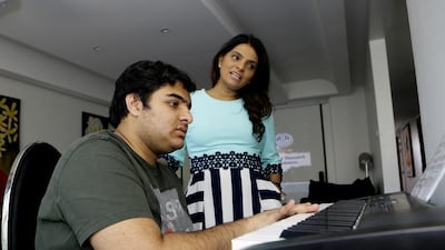 Like many parents with children with special needs, Savitri Kisani struggled to find a place for her son, Krishna, once he turned 17. Jeffrey E Biteng / The National