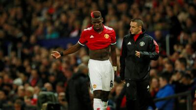 Manchester United's Paul Pogba walks off as he is substituted for Marouane Fellaini after sustaining an injury. Jason Cairnduff / Reuters