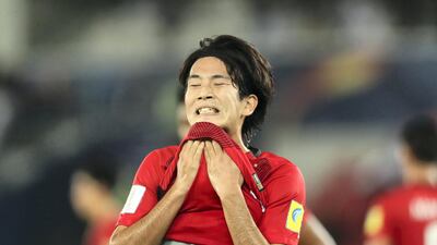 Shinya Yajima of Urawa Red Diamonds reacts to a missed chance during the FIFA Club World Cup UAE 2017 match between Al Jazira and Urawa Red Diamonds at Zayed Sports City Stadium on December 9, 2017 in Abu Dhabi, United Arab Emirates. (Photo by Matthew Ashton - AMA/Getty Images)