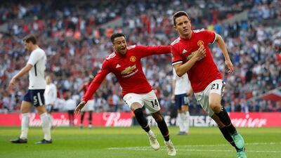 Ander Herrera, right, after scoring Manchester United's second goal against Tottenham in the FA Cup semi-final. Carl Recine / Reuters