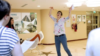 Atkins Corporate Choir practicing on a Tuesday night in Bur Dubai. Instructor Kim A Page has been teaching them for 5 weeks so far. Anna Nielsen for The National