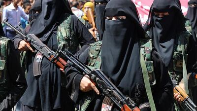 Women fighters in the pro-government resistance movement attend a rally marking the anniversary of south Yemen’s revolt against British colonial rule on October 14, 2015, in Taez city. Ahmad Al Basha / AFP