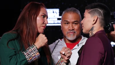 Cris Cyborg, left, and Larissa Pacheco face off at the PFL 'Battle of the Giants' press conference. Chris Whiteoak / The National