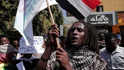Demonstrators protest in Khartoum against military rule on February 14. AP