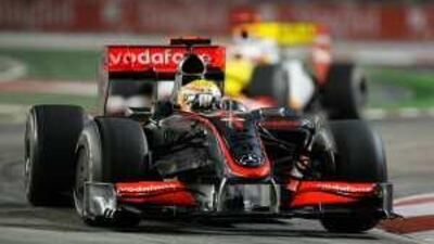 Lewis Hamilton in action in his McLaren-Mercedes last night on his way to victory in the Singapore Grand Prix.