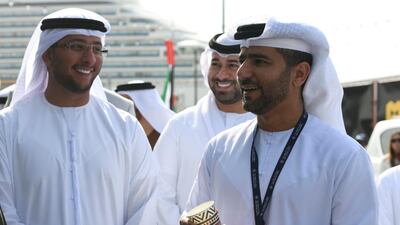 Mohamed Juma Al Shamisi, Abu Dhabi Ports Group's chief executive, chats to vendors during the Marsa Mina opening. Khushnum Bhandari for The National