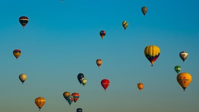 Hot air balloons fly over the city of Igualada during an early flight as part of the European Balloon Festival in Igualada, Spain. The European Balloon Festival has become the most important hot air balloon event in Spain and one of the biggest in Europe. Getty Images