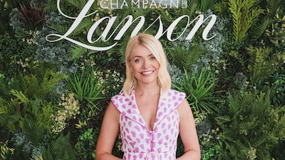 British TV presenter Holly Willoughby arrives for opening day at The Championships, Wimbledon on June 27, in London, England. Getty Images for Champagne Lanson