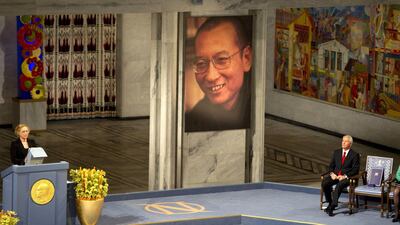 Norwegian actress Liv Ullmann reads Liu Xiaobo's text "I have no enemies" next to the The Nobel Peace Prize committee Chairman Thorbjoern Jagland. Li won in 2010 for his long struggle for human rights in China Odd Andersen / AFP