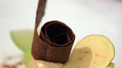 Foie gras apple with the gaufrette biscuit sitting on top.