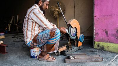 Muhammed Mufis, a Bangladeshi who has been in the UAE for two years, works in a small welding shop in the old quarter of Al Rams. Plans are under way to redevelop the neighbourhood in which his shop is located.