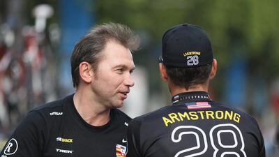 Having Lance Armstrong's back has cost former USPS/Discovery Channel cycling sports director Johan Bruyneel, left, a 10-year ban from the sport the American Arbitration Association said in a statement. Bryn Lennon / Getty Images