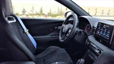 The Veloster’s cabin has an ambience of cheapness, but the lightweight N seats are nicely sculpted.