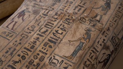 A "rare" papyrus scroll, expected to measure about 9 metres, was also found and could be part of the Book of the Dead. Mahmoud Nasr / The National