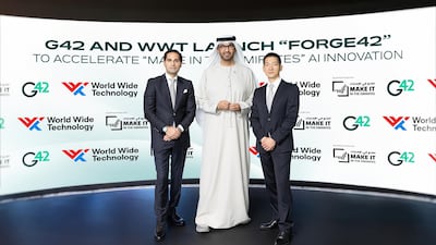 Dr Sultan Al Jaber, Minister of Industry and Advanced Technology, at the launch of Forge42 with Peng Xiao, group chief executive of G42, right, and Omar Mir, international board member of WWT, during the Make it in the Emirates forum in Abu Dhabi. Photo: G42