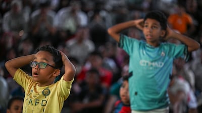 Fans in Cairo watch the Egyptian team take on Belgium. EPA
