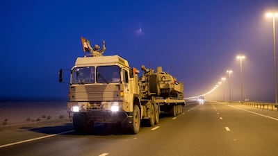 A convoy of UAE military vehicles and personnel travels from Al Hamra Military Base to Zayed Military City, marking the return of the first batch of UAE Armed Forces military personnel from Yemen. Ryan Carter / Crown Prince Court — Abu Dhabi