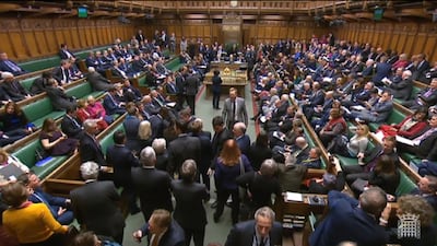 A handout video-grabbed still image from a video made available by the UK Parliamentary Recording Unit shows MPs in the House of Commons following a vote on Prime Minister May's Brexit strategy in London, Britain. EPA