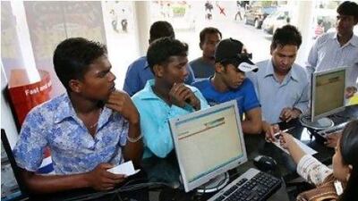 Non-resident Indians are sending more money home as the rupee has continually fallen. Jaime Puebla / The National